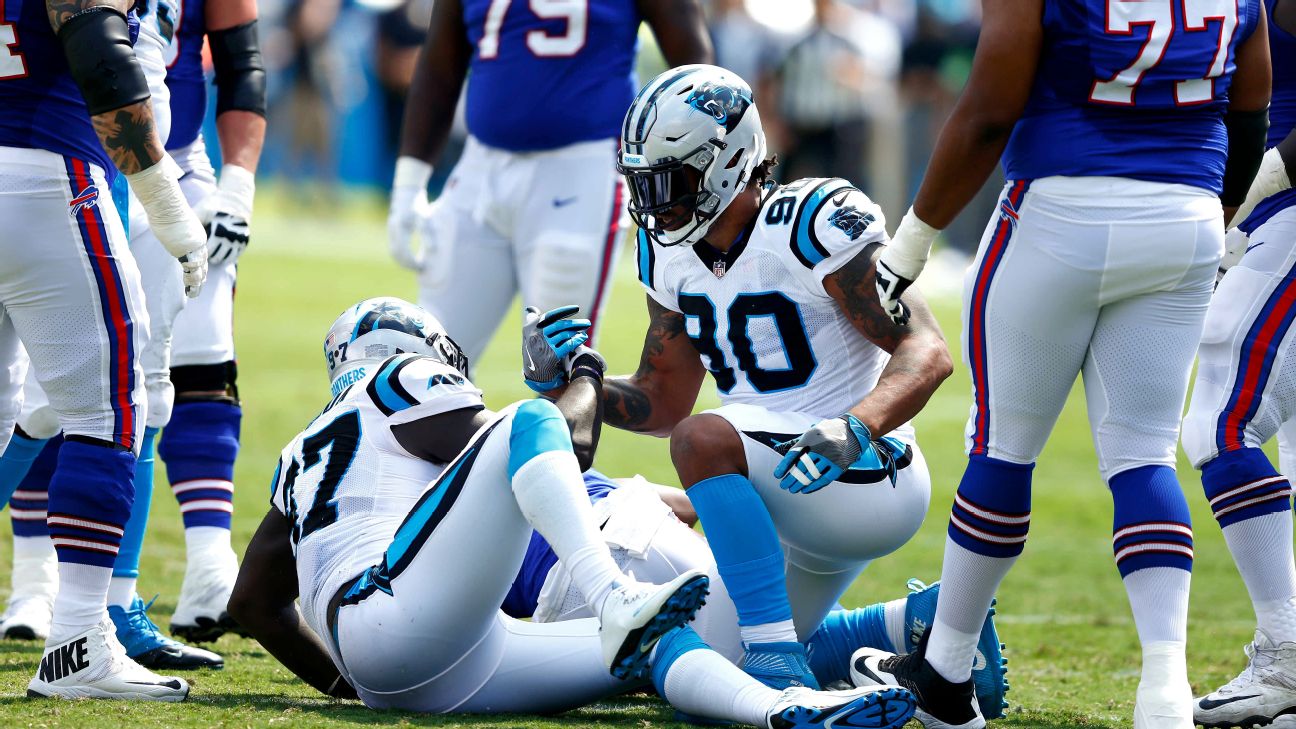 Carolina Panthers defensive end Mario Addison, left, and defensive