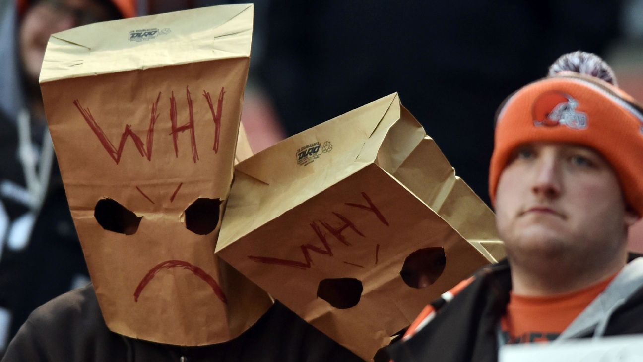 Sad Browns fans get creative with their paper bags and signs