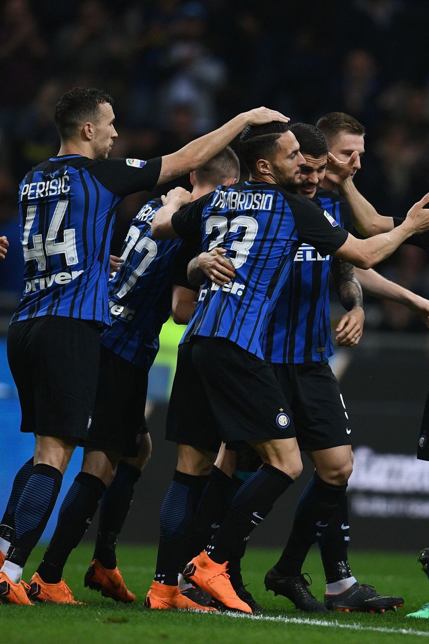 Inter Milan's Ivan Perisic, right, celebrates with his teammate Mauro  Icardi after scoring during a Serie A soccer match between Inter Milan and  Torino, at the San Siro stadium in Milan, Italy