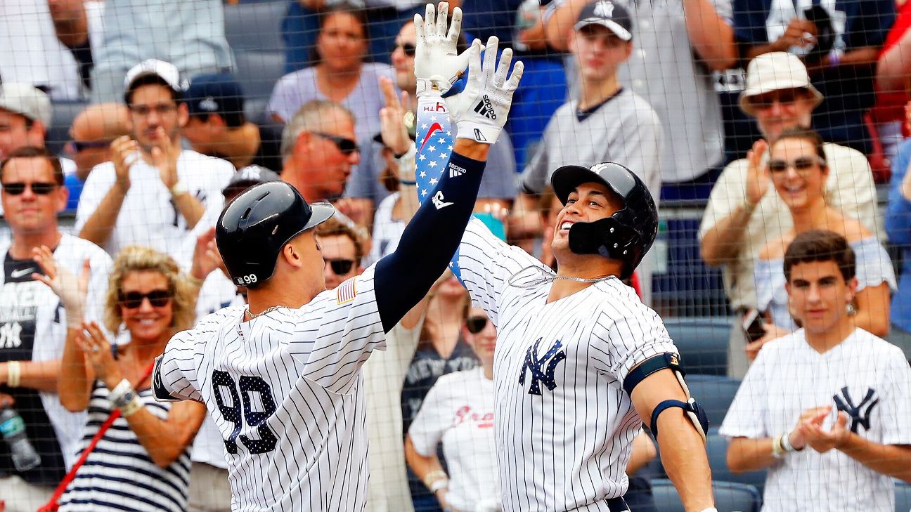 New York Yankees' Greg Bird, right, celebrates with Gary Sanchez