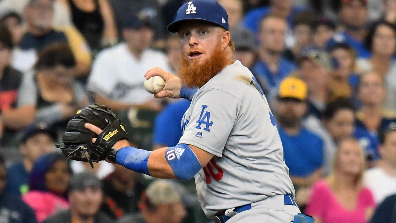 Los Angeles Dodgers' Justin Turner breaks left wrist after being