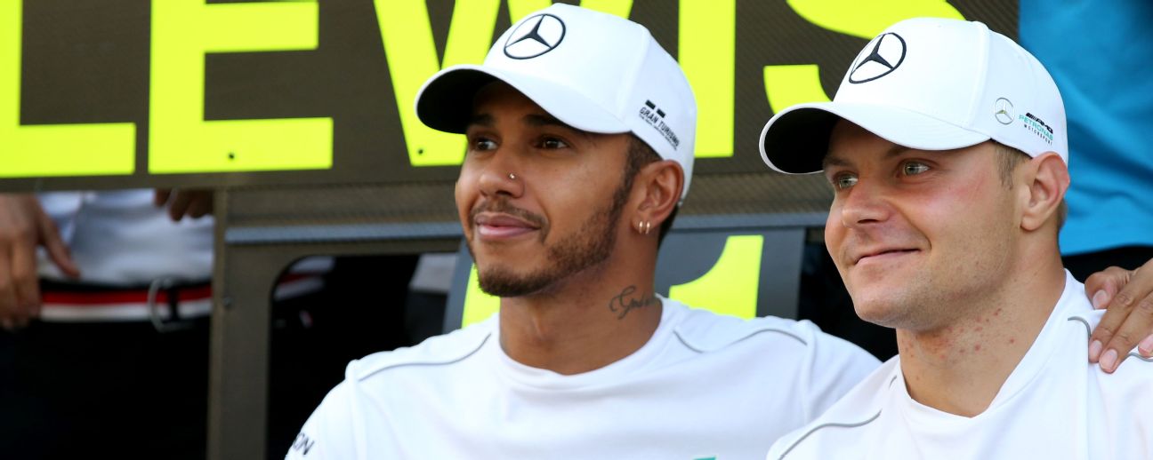 Race winner Lewis Hamilton of Great Britain and Mercedes GP and second placed Valtteri Bottas of Finland and Mercedes GP celebrate with their team.