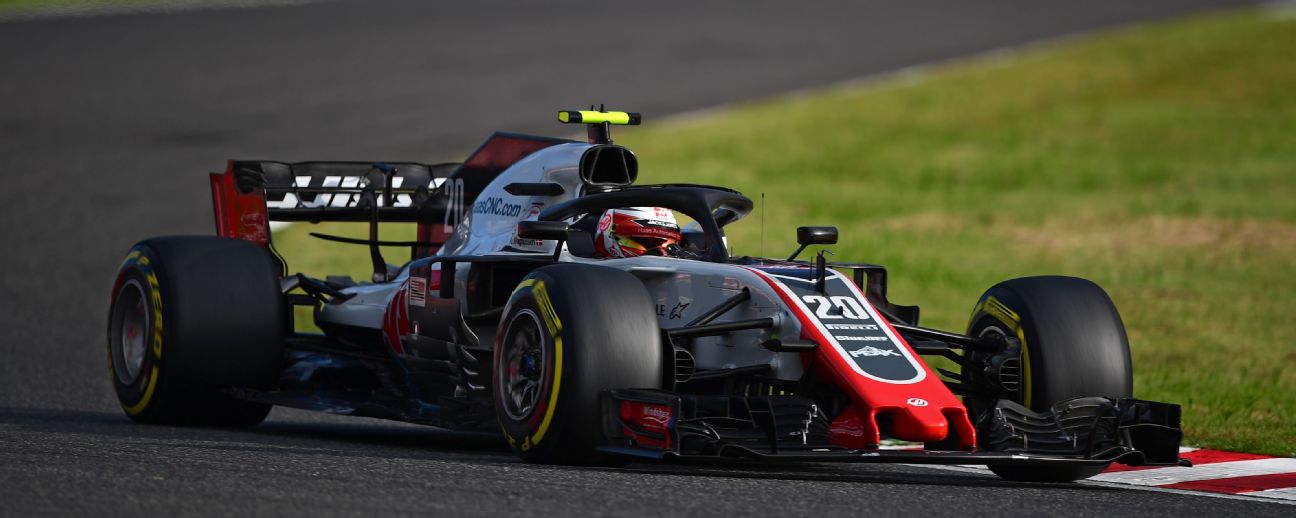 Haas F1's Danish driver Kevin Magnussen takes part in the qualifying session for the Formula One Japanese Grand Prix at Suzuka.