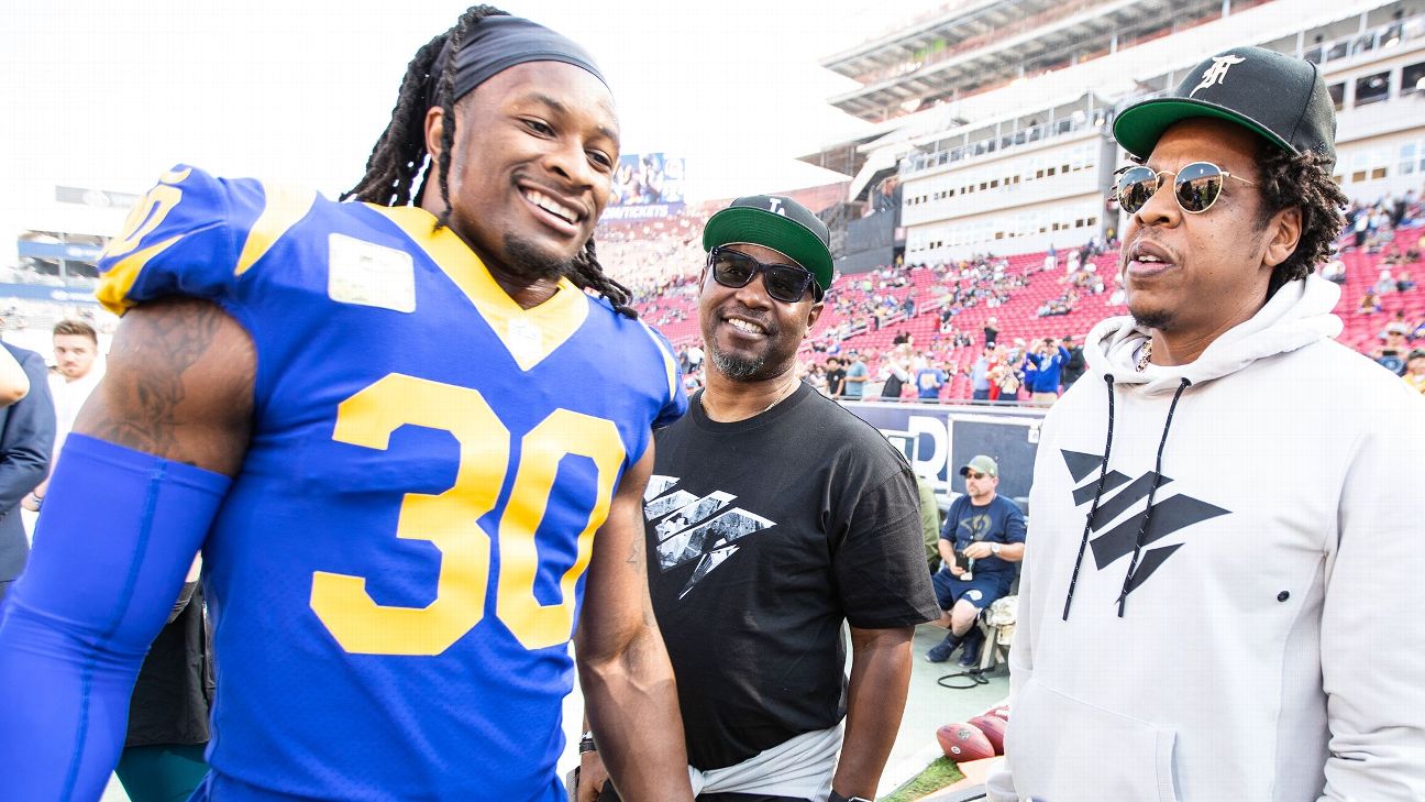 Rapper YG wears the jersey of Los Angeles Rams wide receiver