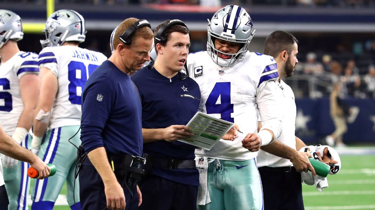 Dallas Cowboys offensive coordinator Kellen Moore reacts to a play