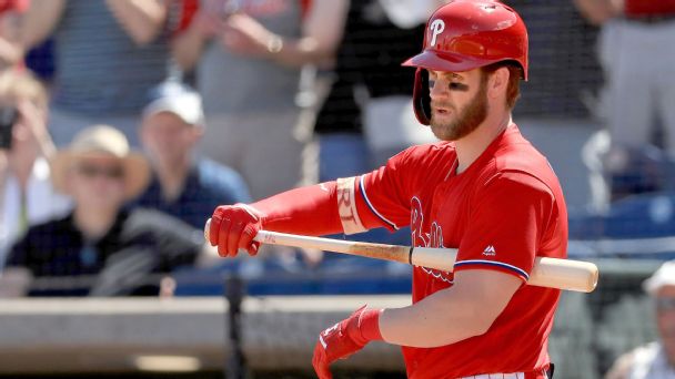 Colorado Rockies' Trevor Story looks skyward as he arrives home