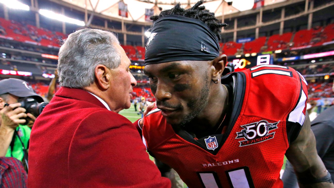 Atlanta Falcons owner Arthur Blank models a new Falcons' jersey