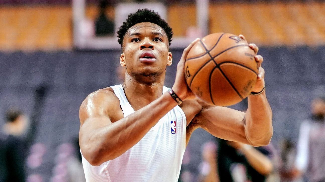 LOOK: Giannis Antetokounmpo points to the sky and other pictures from the  day in the NBA