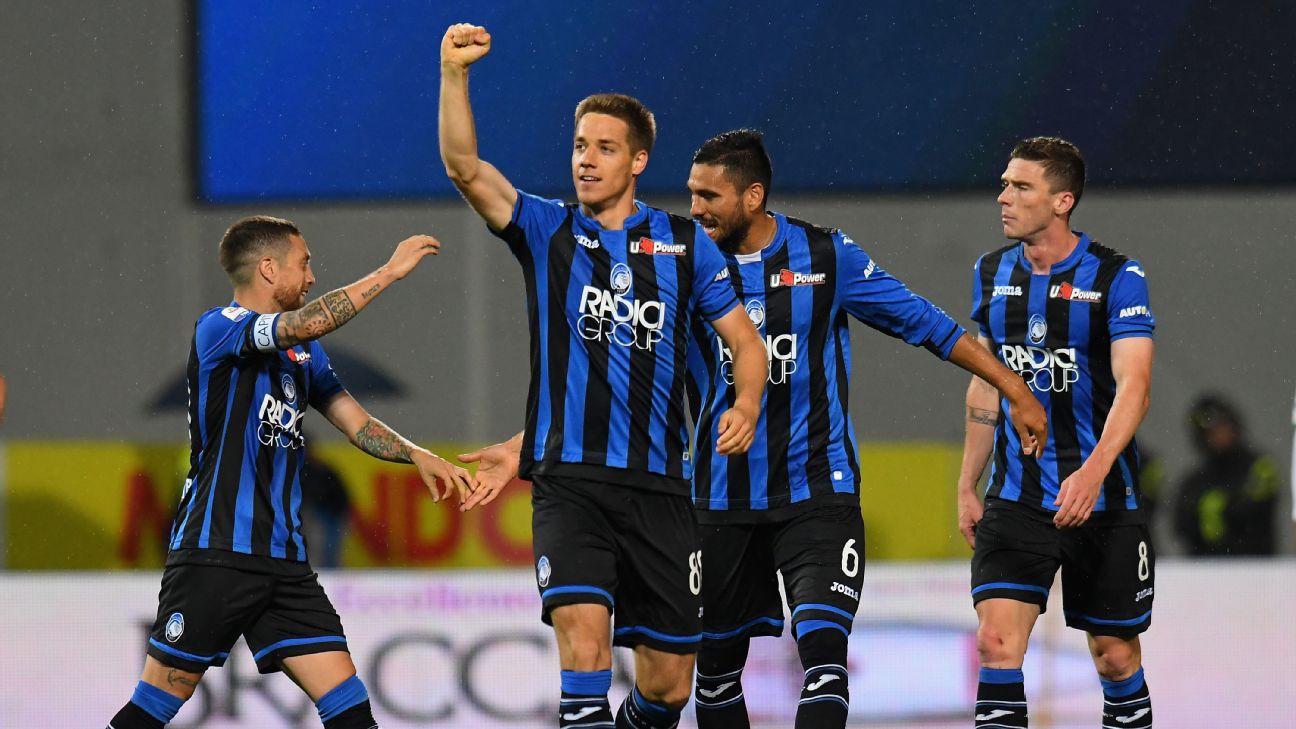 Atalanta players celebrate during their Serie A match against Sassuolo.