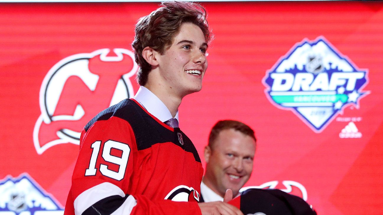 New Jersey Devils place Jack Hughes on IR with dislocated shoulder - ESPN