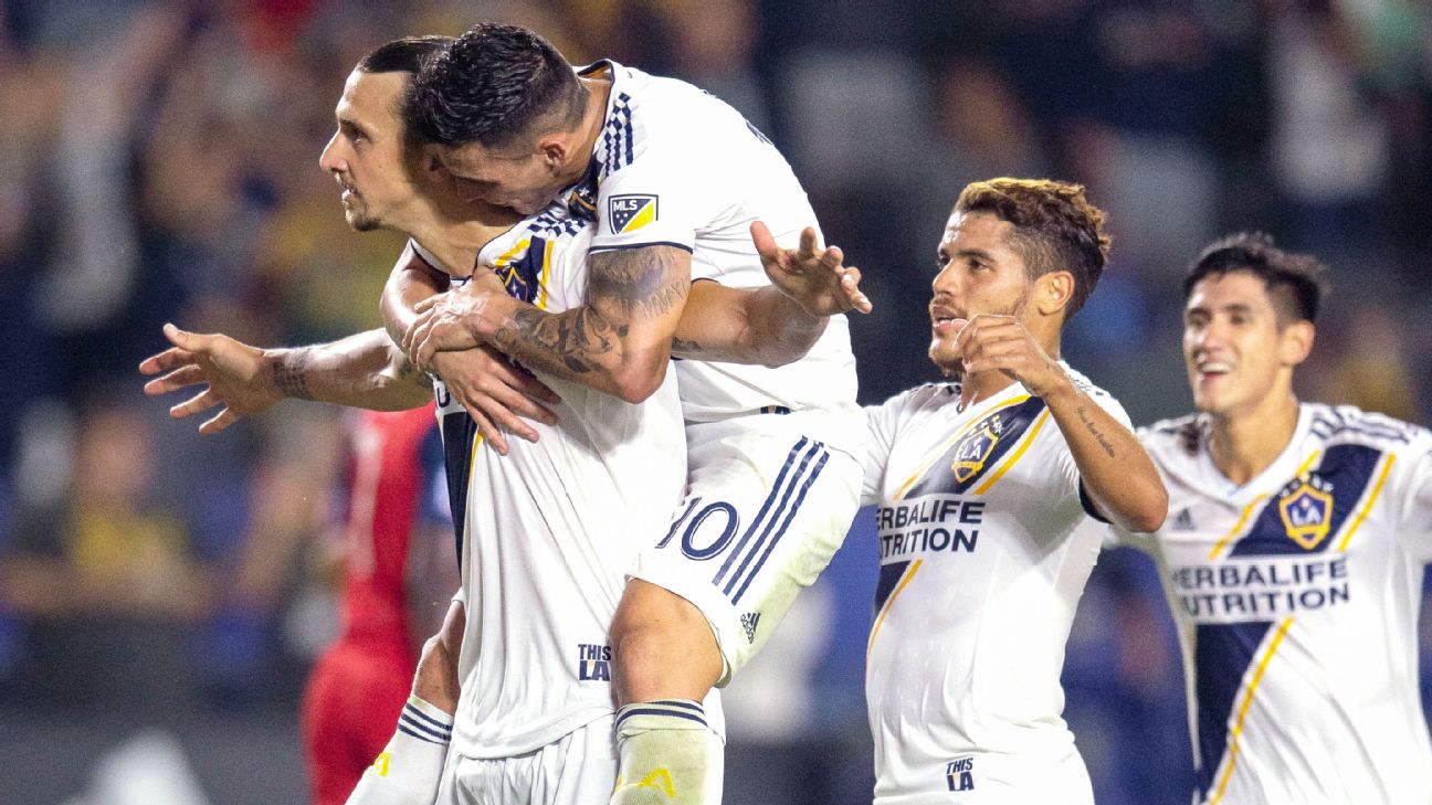 Zlatan Ibrahimovic and Cristian Pavon celebrate during the LA Galaxy's MLS win over FC Dallas. Zlatan Ibrahimovic and Cristian Pavon celebrate during the LA Galaxy's MLS win over FC Dallas.