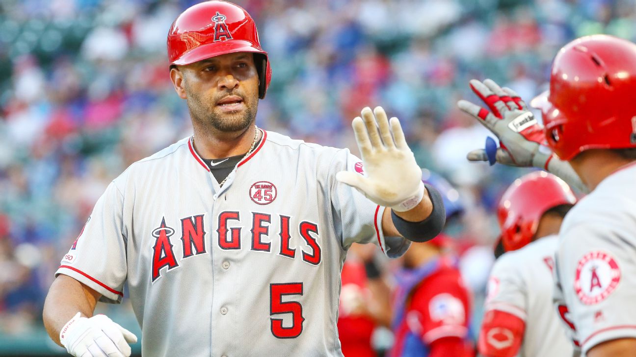 Pujols, Angels surge late, rally past sloppy Yankees