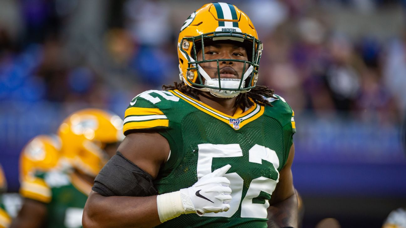 Green Bay Packers linebacker Rashan Gary (52) rushes during an NFL