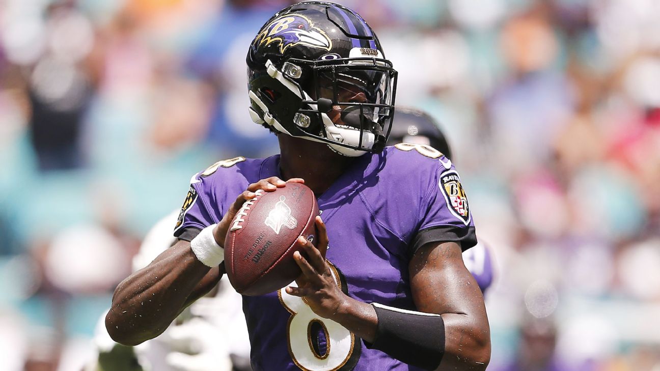 Baltimore Ravens quarterback Lamar Jackson gets away from New England  Patriots' blitz for 8-yard scramble