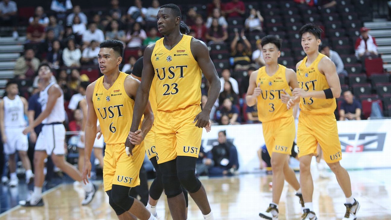 UST pulls out overtime win, keeps NU 