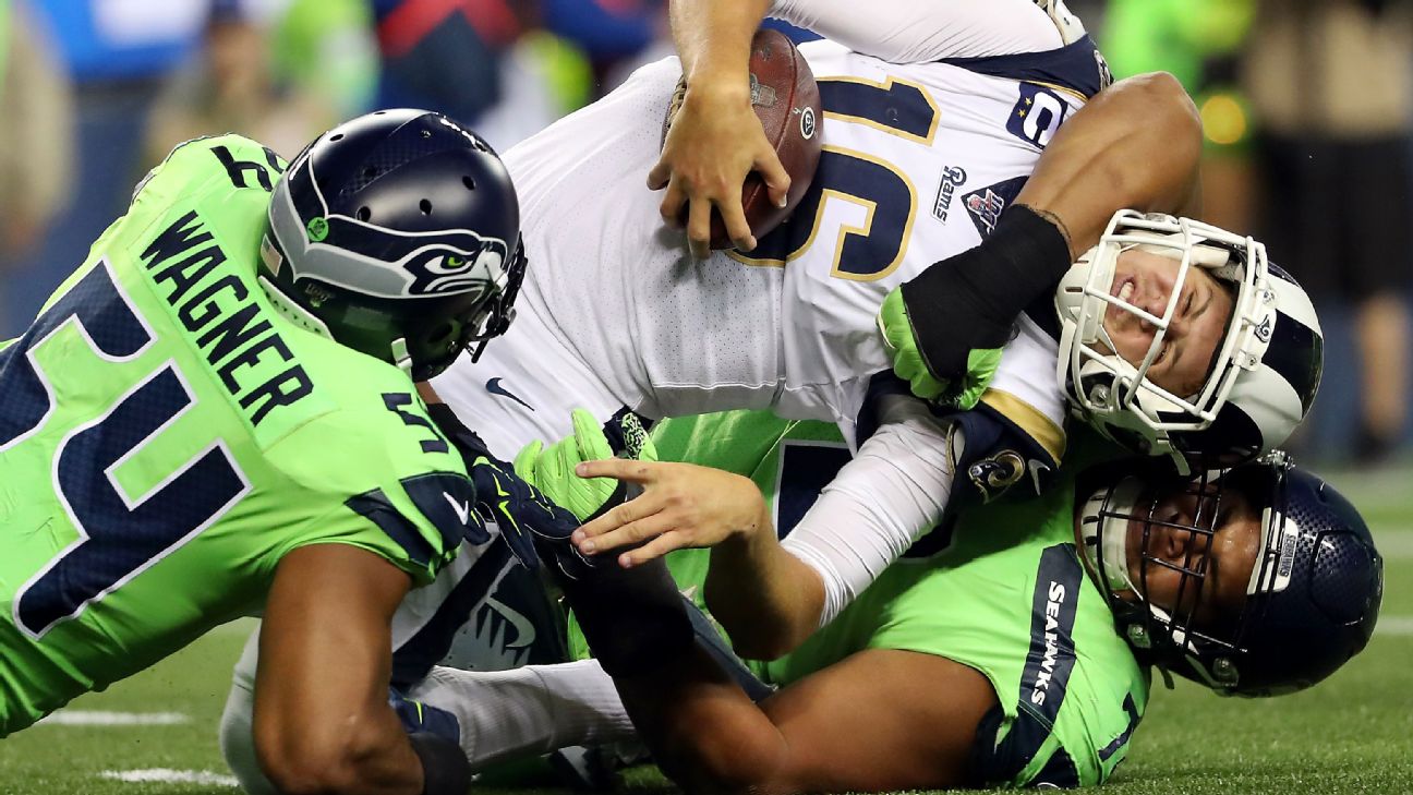 Seattle Seahawks defensive tackle Al Woods (99) is on the sideline