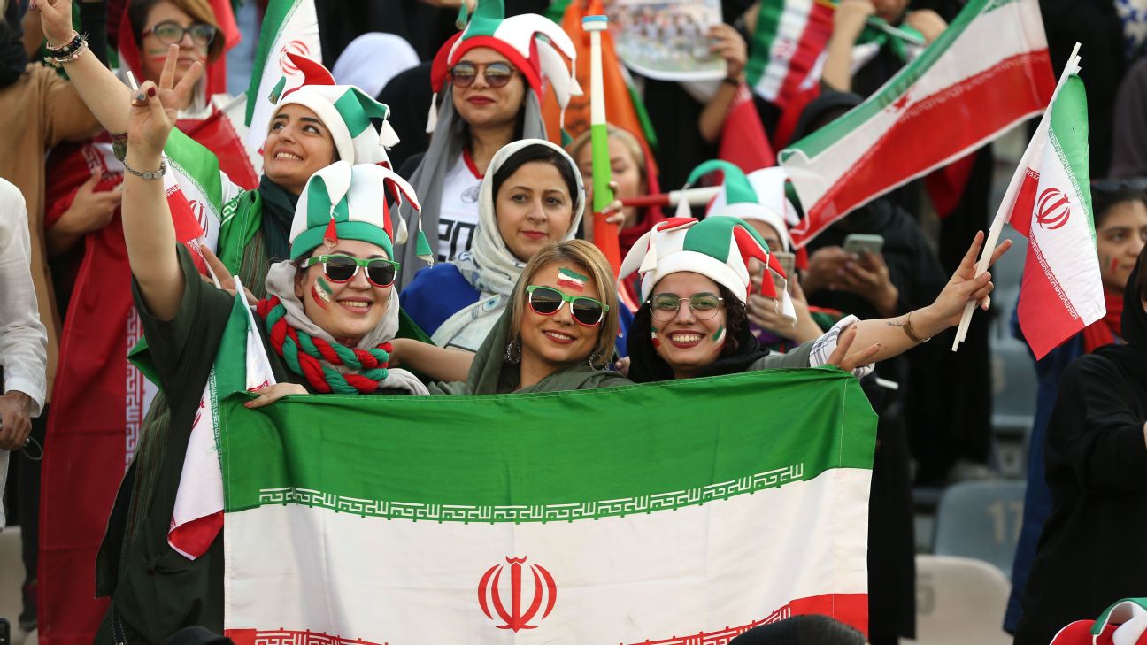 Iranian women cheer ahead of the World Cup Qatar 2022 Group C qualification football match between Iran and Cambodia Iranian women cheer ahead of the World Cup Qatar 2022 Group C qualification football match between Iran and Cambodia