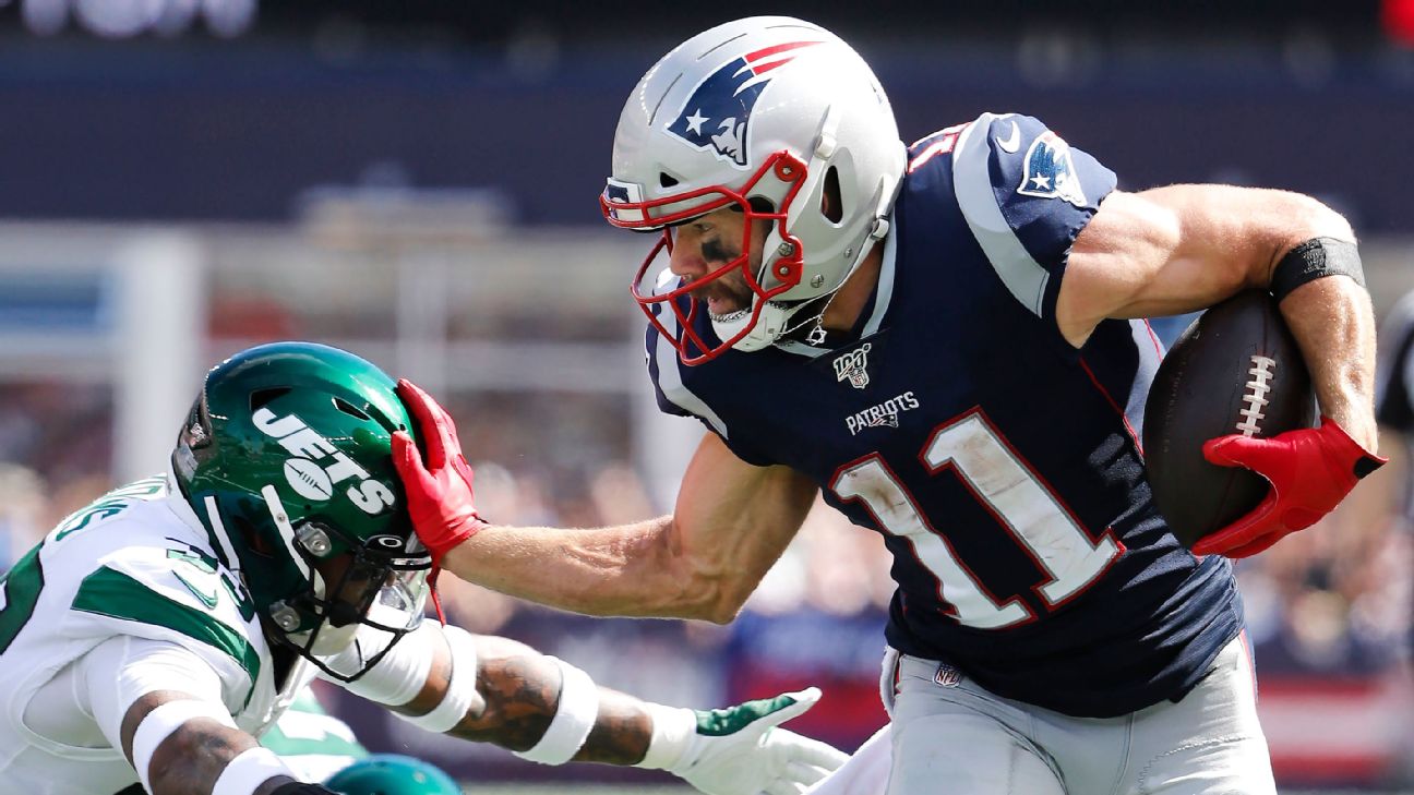 New England Patriots Julian Edelman gets tackled by New York Jets