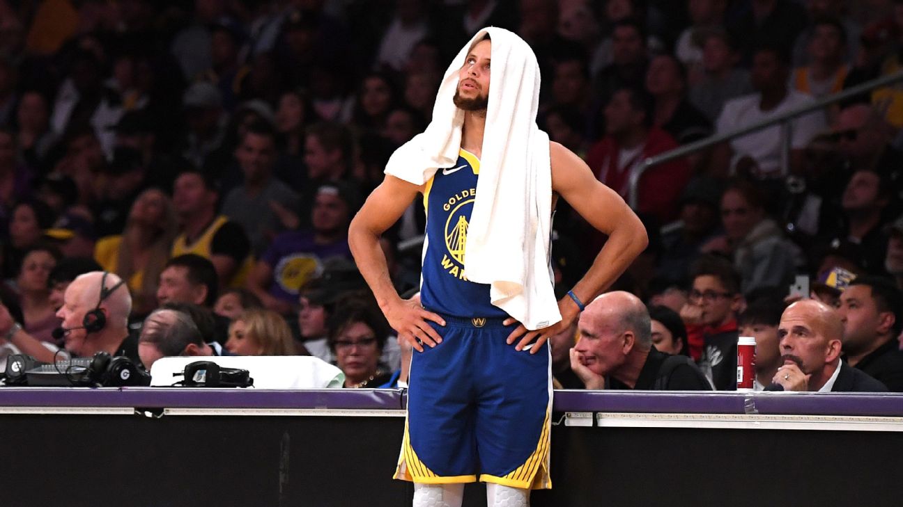 Photos track Stephen Curry's road to recovery from hand injury to