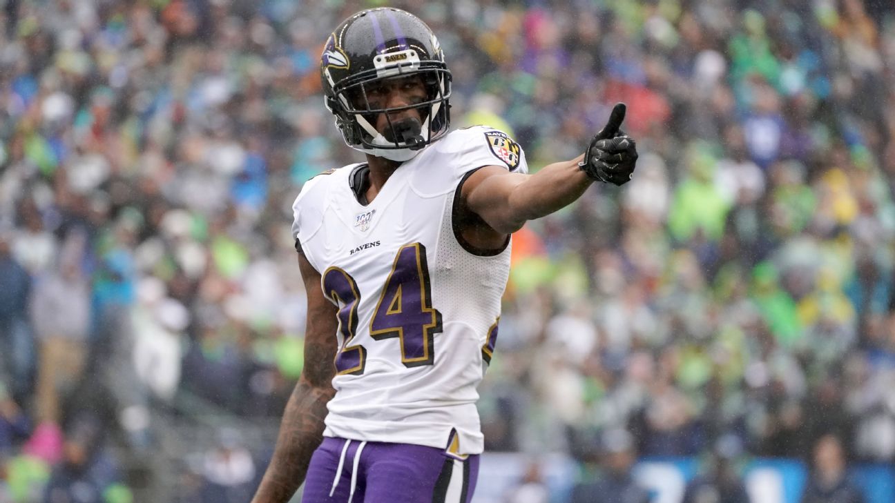 Baltimore Ravens cornerback Marcus Peters (24) reacts to a play