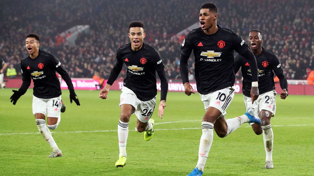 Manchester United players celebrate during their Premier League draw at Sheffield United. Manchester United players celebrate during their Premier League draw at Sheffield United.