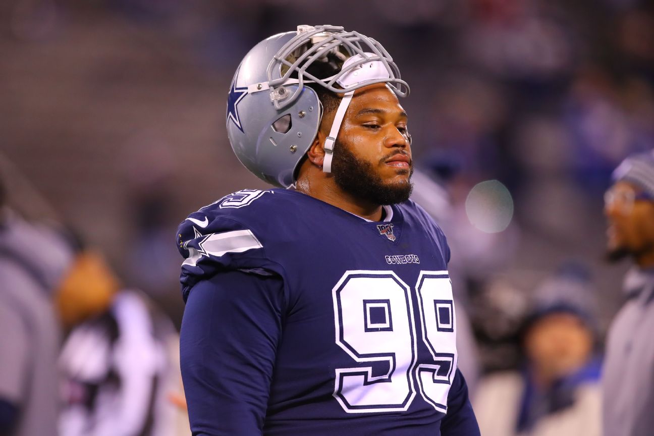Source: Cowboys cut Woods after drafting 2 DTs