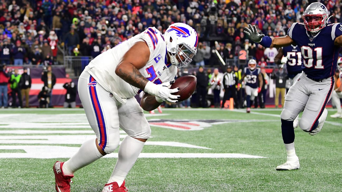 Buffalo Bills offensive tackle Dion Dawkins (73) greets fans after