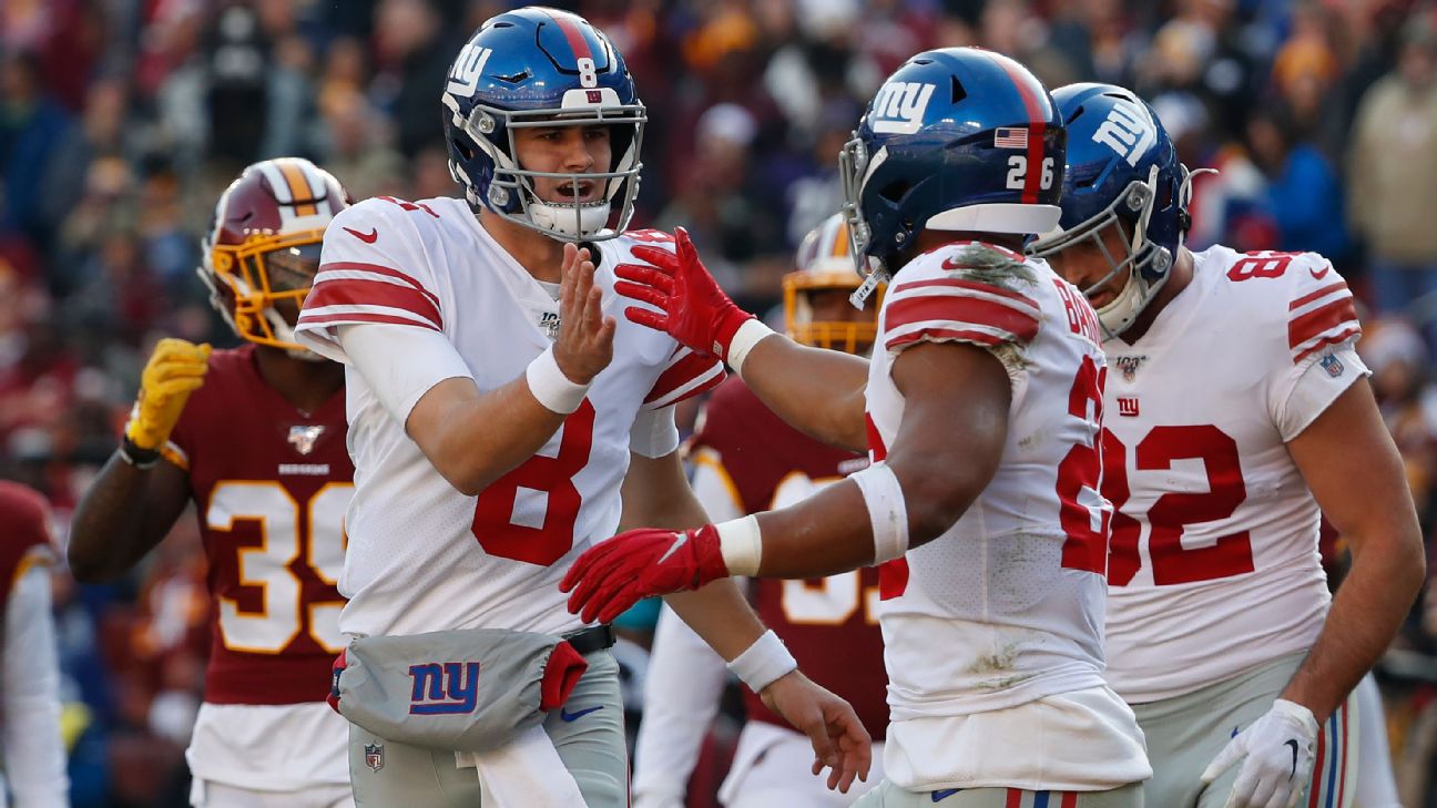 Jones throws for 5 TDs, Giants beat Redskins in overtime