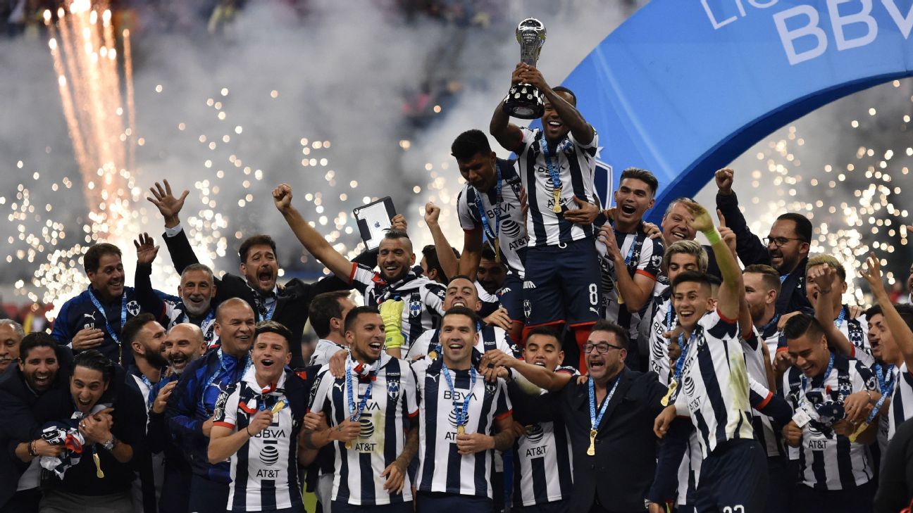 Dorlan Pabon lifts the trophy following Monterrey's Liga MX Apertura final win over Club America. Dorlan Pabon lifts the trophy following Monterrey's Liga MX Apertura final win over Club America.