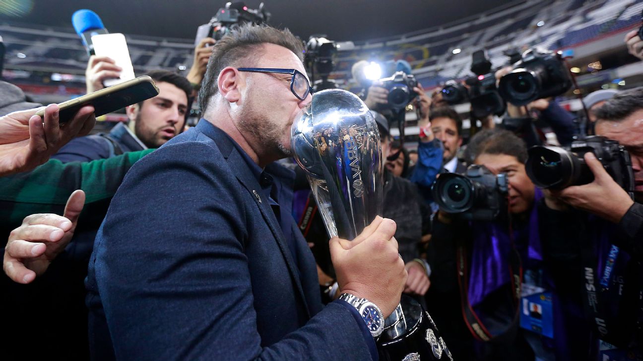Antonio Mohamed kisses the trophy after his Monterrey beat America in the Liga MX Apertura final. Antonio Mohamed kisses the trophy after his Monterrey beat America in the Liga MX Apertura final.