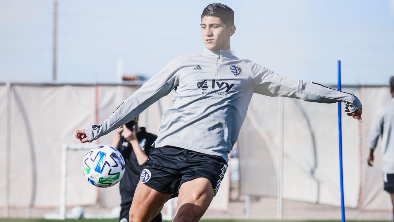 Alan Pulido strikes a ball during Sporting Kansas City's preseason camp. Alan Pulido strikes a ball during Sporting Kansas City's preseason camp.