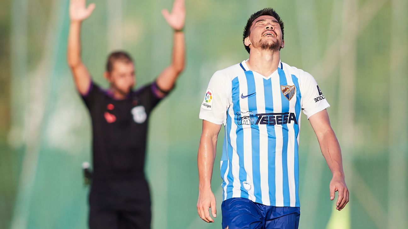 Shinji Okazaki reacts during Malaga's preseason training camp. Shinji Okazaki reacts during Malaga's preseason training camp.