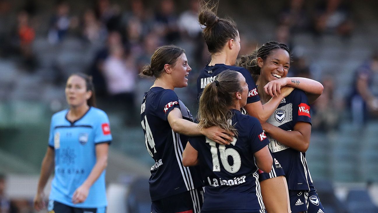 Melbourne Victory celebrate a goal by Darian Jenkins (R) during the round 14 W-League match Melbourne Victory celebrate a goal by Darian Jenkins (R) during the round 14 W-League match