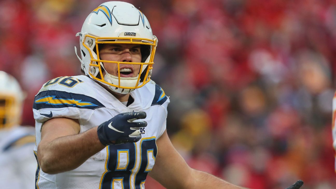 Los Angeles Chargers' Hunter Henry, right, makes a catch as