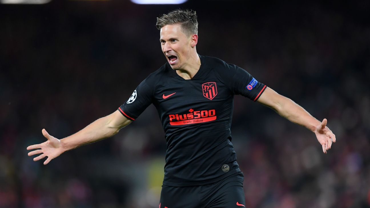 Marcos Llorente celebrates after scoring in Atletico Madrid's Champions League win over Liverpool.