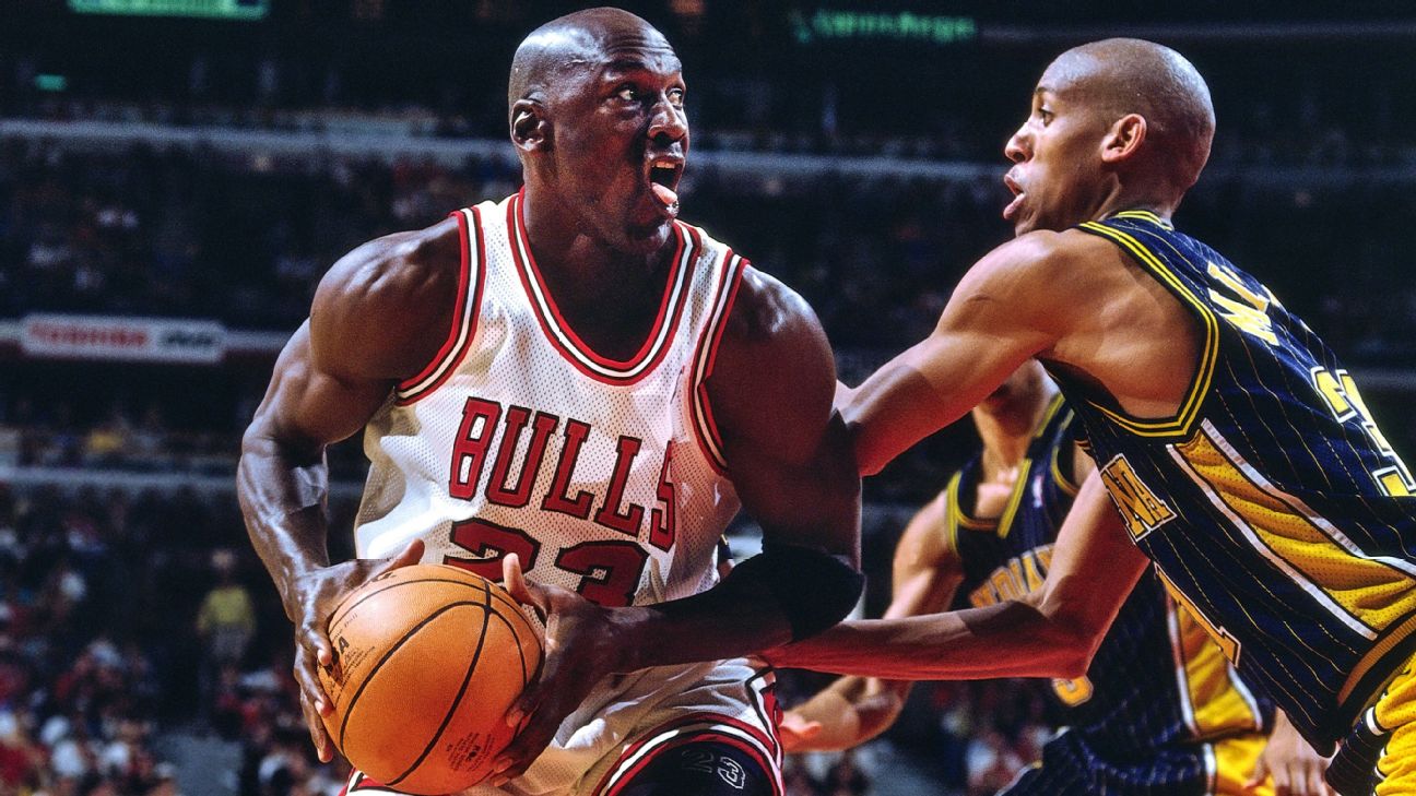 Michael Jordan and the Chicago Bulls defeat the Utah Jazz winning