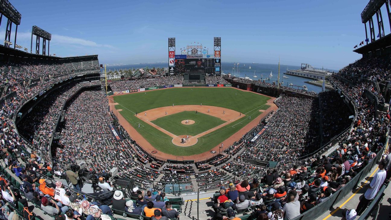 Fans receive San Francisco Giants Pride Jerseys as part of the