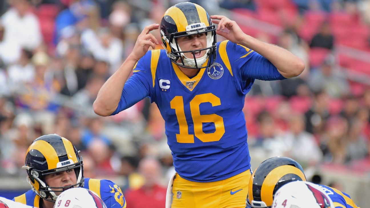 Los Angeles Rams quarterback Jared Goff (16) off balance after