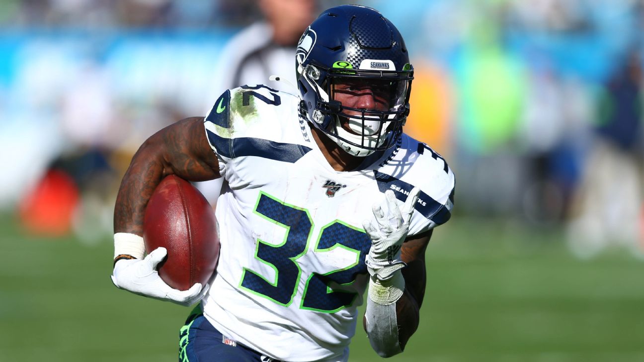 Seattle Seahawks running back Chris Carson gestures while smiling after an  NFL football game against the Dallas Cowboys, Sunday, Sept. 27, 2020, in  Seattle. The Seahawks won 38-31. (AP Photo/Stephen Brashear Stock