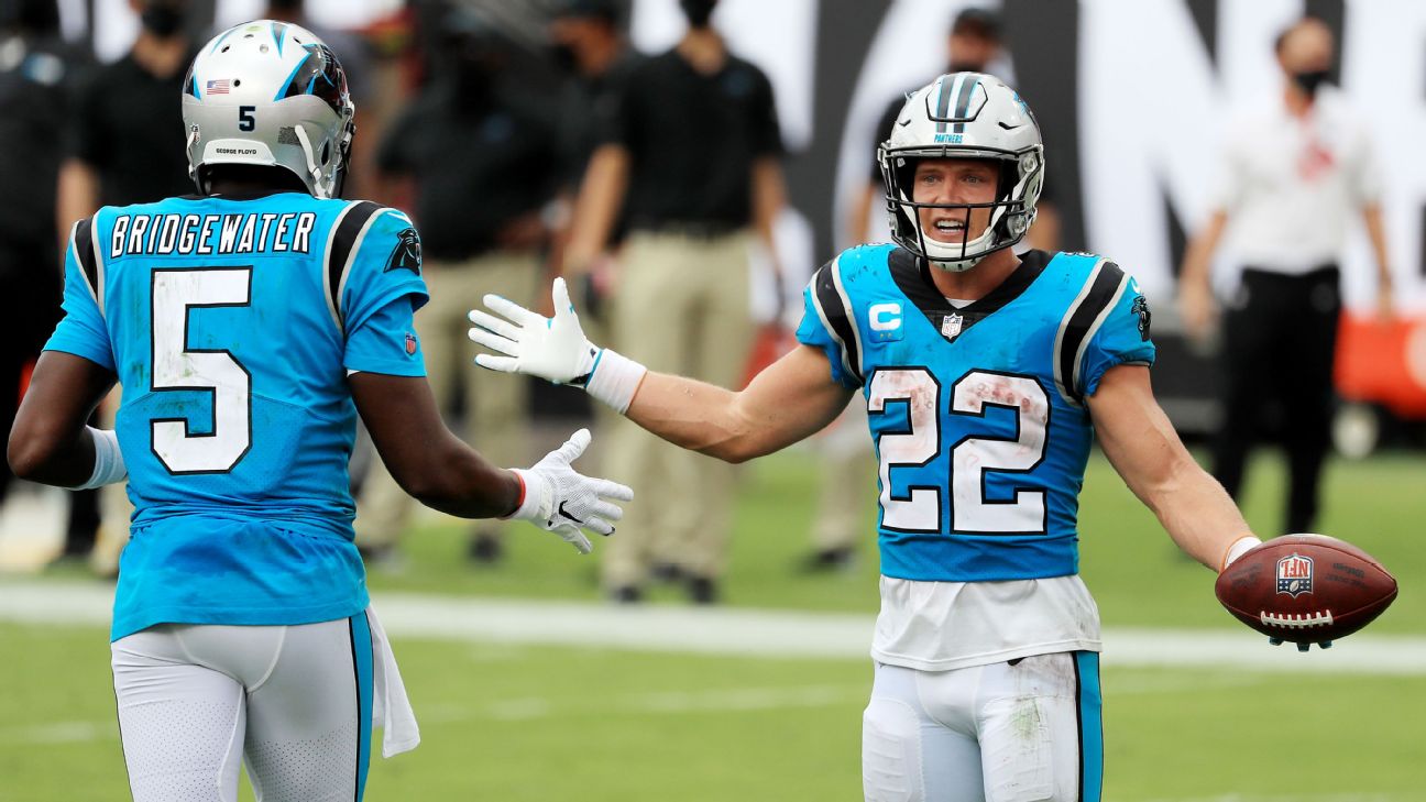 Carolina Panthers running back Christian McCaffrey, left, and