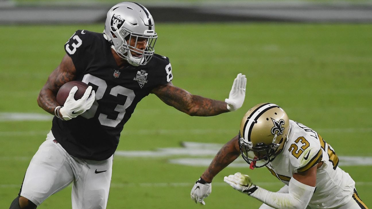 Oakland Raiders tight end Darren Waller runs the ball during an NFL football  game against the D …