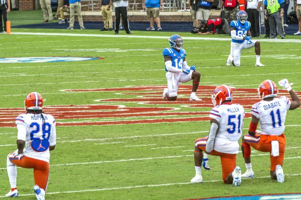 Florida, Ole Miss jointly take knee to draw attention to injustice