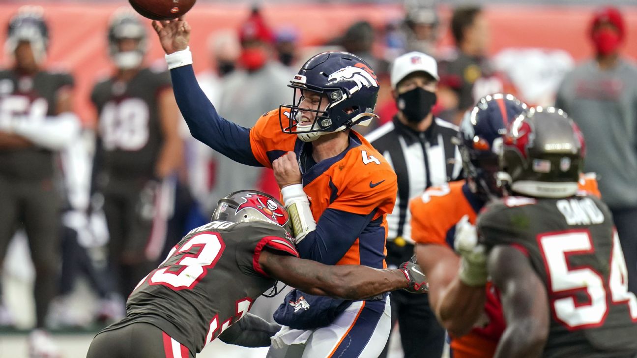 Denver Broncos quarterback Brett Rypien throws a pass during the second  half of the team's Pro …