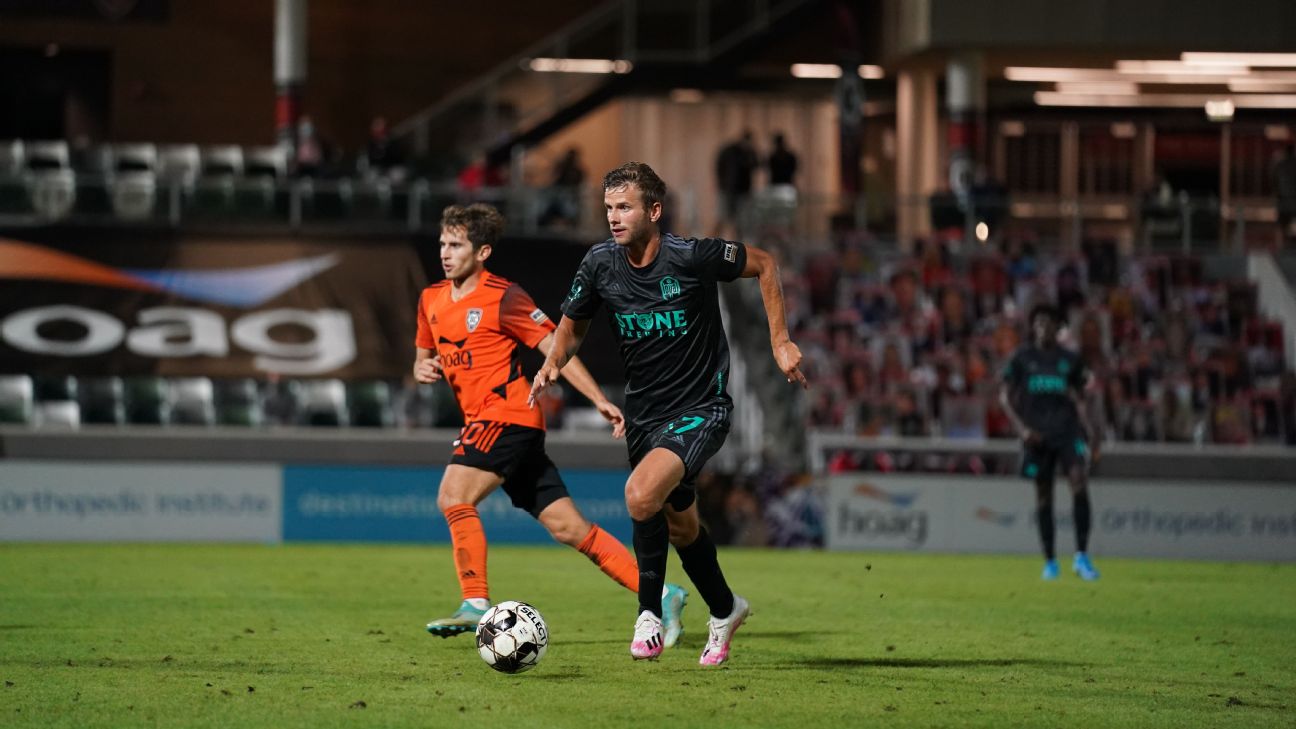 San Diego Loyal walks off pitch after Phoenix Rising player