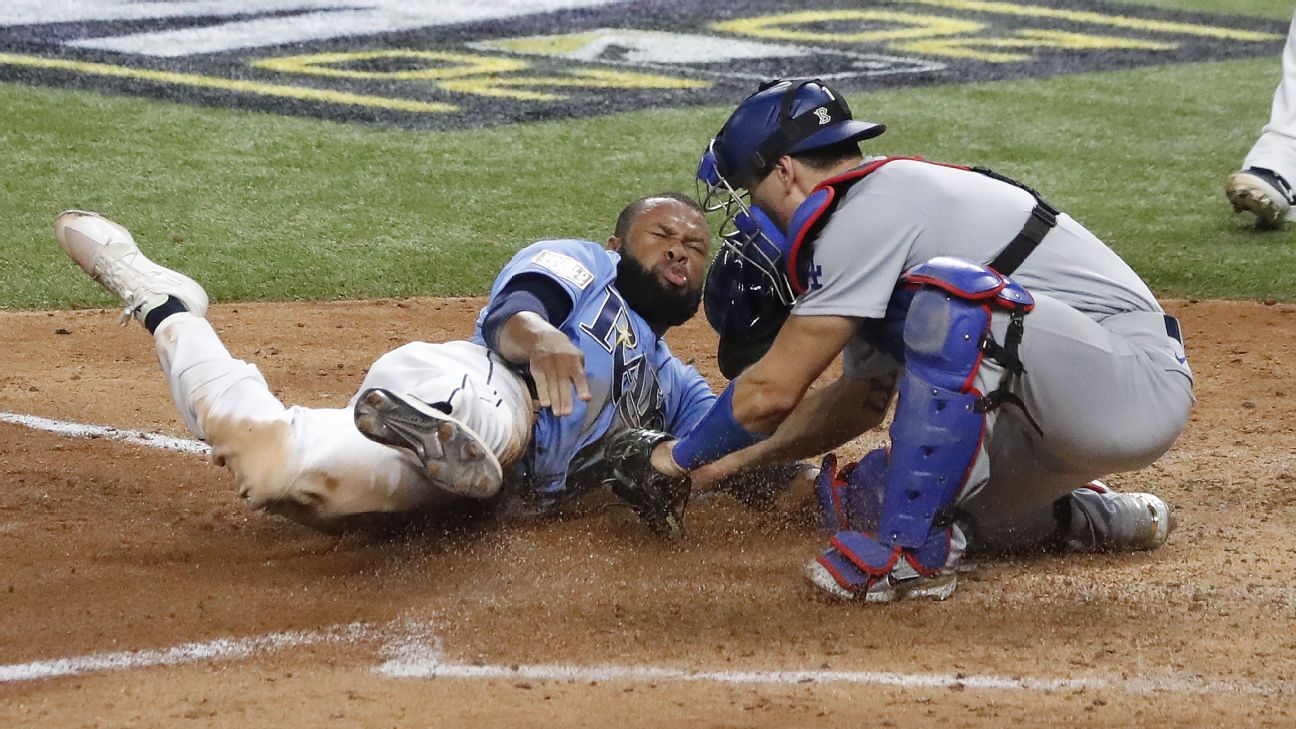 Rays' Manuel Margot tries to steal home in Game 5 of the World Series