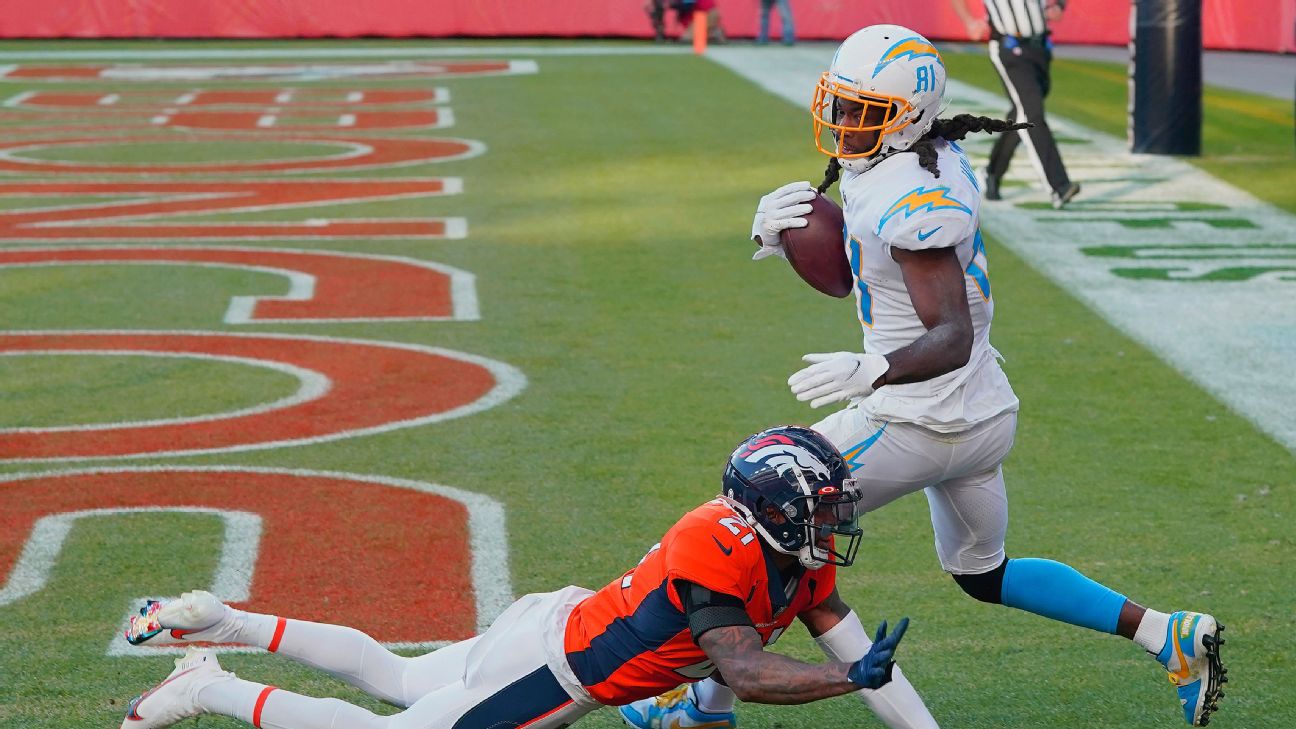 Los Angeles Chargers wide receiver Mike Williams (81) makes a catch over Las  Vegas Raiders stro …