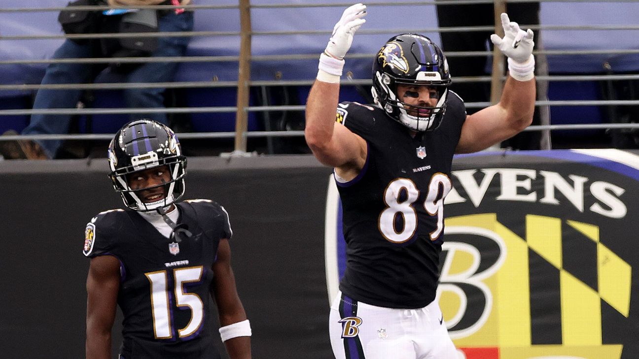 Baltimore Ravens tight end Mark Andrews answers questions from