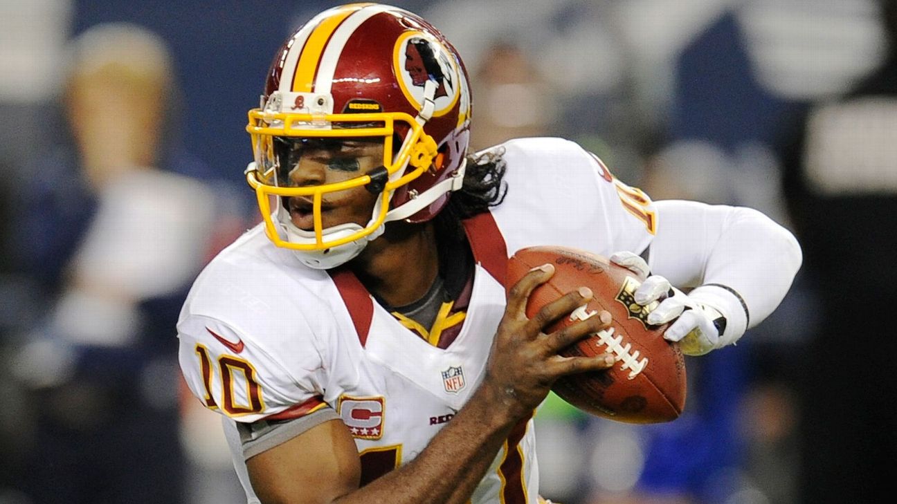 Redskins rookie QB Robert Griffin III uses big block, arm to help