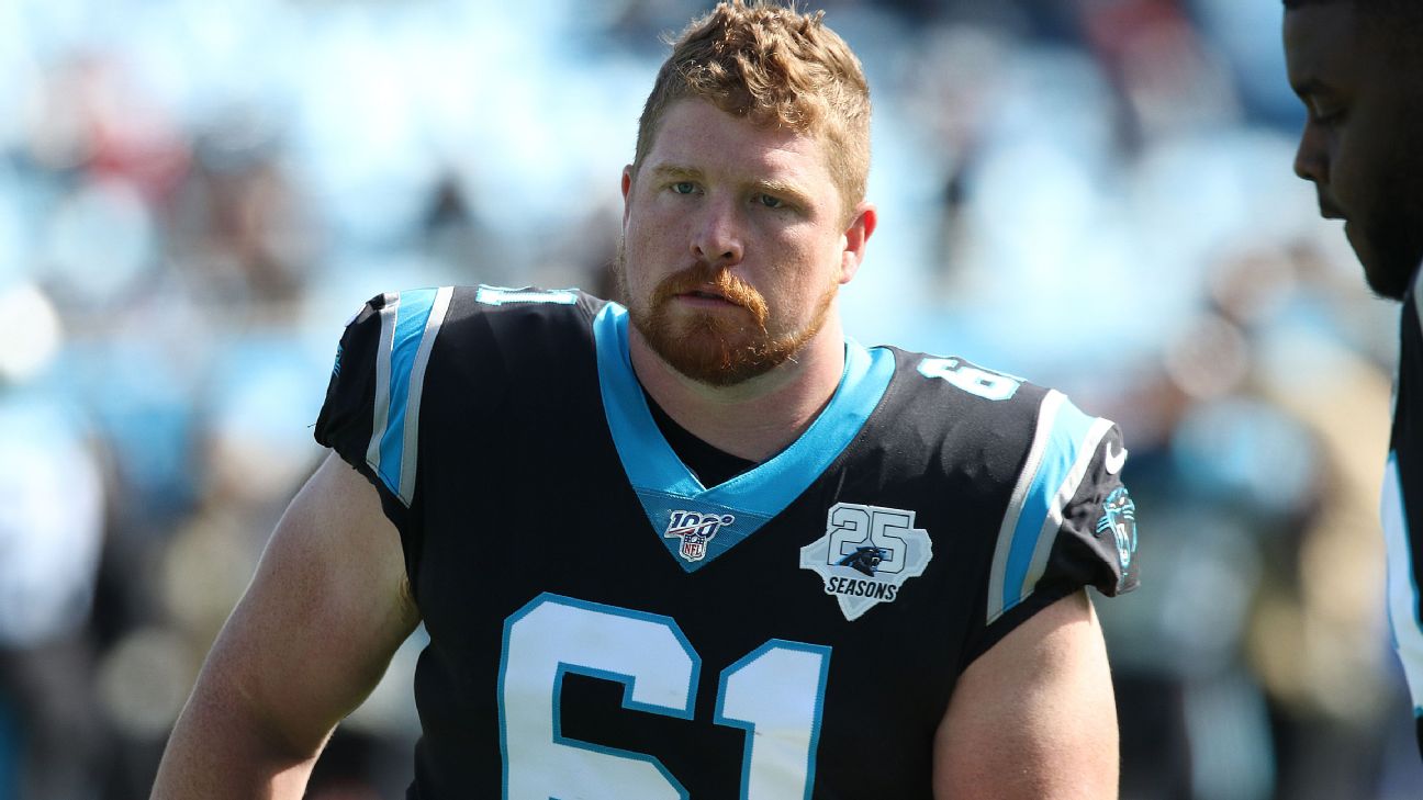 Carolina Panthers safety Sean Chandler, left, tackles New England