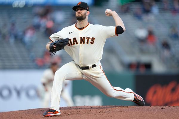 A's sign LHP Wood, get RHP Stripling from Giants